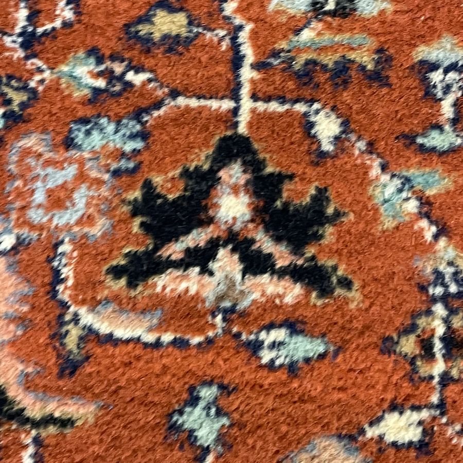 The same area after the hole was rewoven