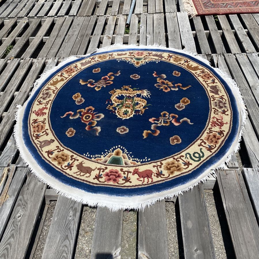 The same round dragon rug after shearing