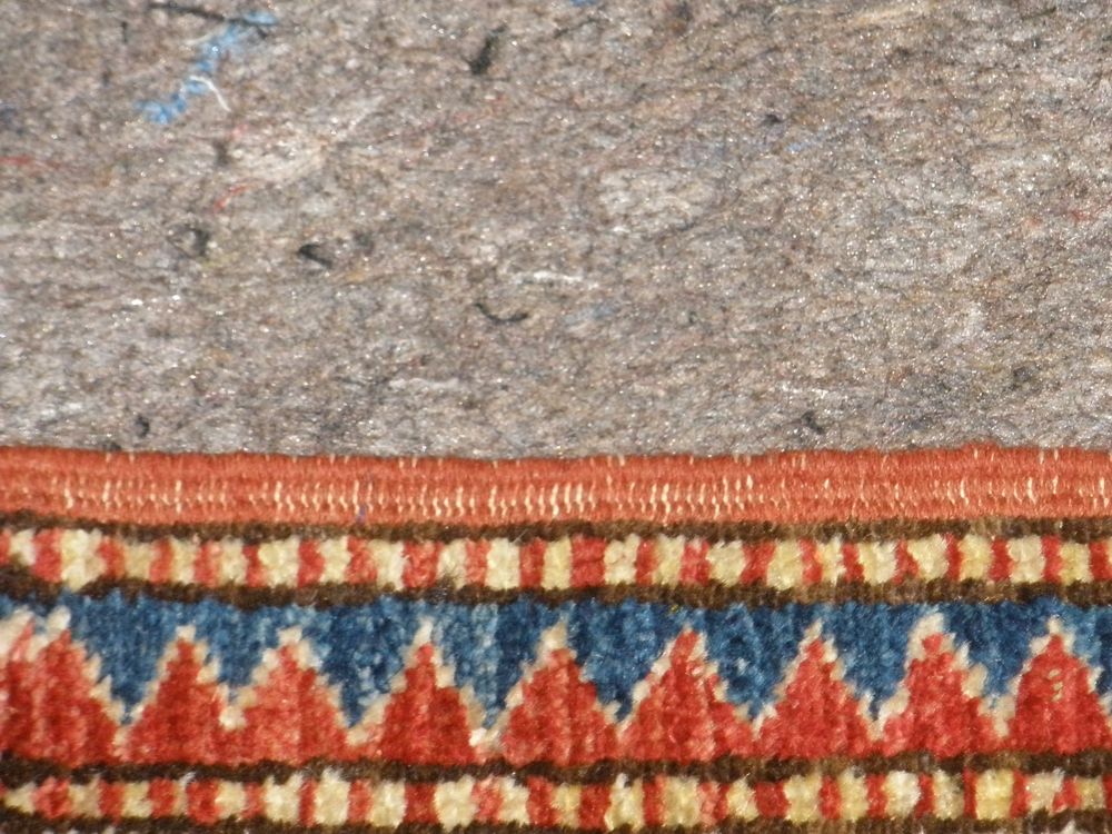 The same rug with the side cord rewrapped